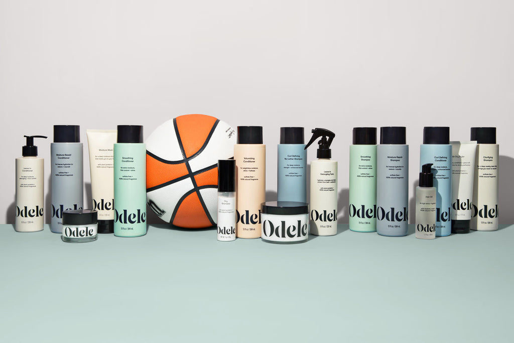 Collection of Odele hair products with a basketball.