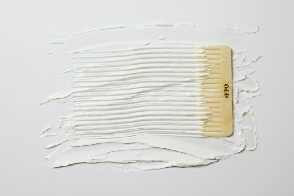 Odele Beauty comb glides through a thick, creamy conditioner