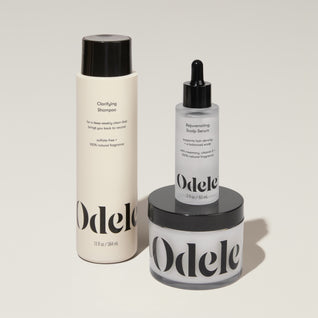 Odele Beauty’s Scalp Care Set is artfully arranged on a light surface.