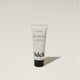 A tube of Odele Air Dry Styler stands upright against a plain, light-colored backdrop with the front of the label facing the camera.