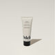 A tube of Odele Leave-in Conditioner stands upright against a plain, light-colored backdrop with the front of the label facing the camera.