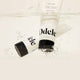 Two Odele Beauty Moisture Mask tubes are partially submerged in clear, bubbly water.