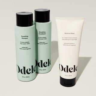 The Odele Smoothing Set stands upright against a plain, light-colored backdrop with the front of the label facing the camera.