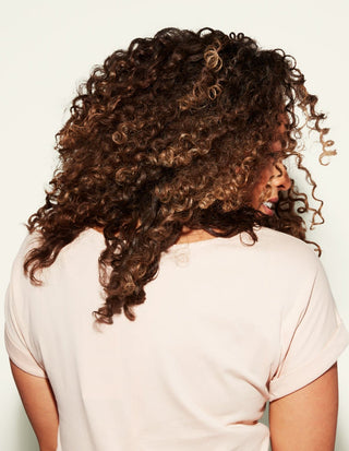 woman with thick curly hair